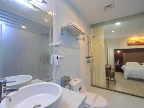Kúpeľňa v ubytovaní Wanxiang Hotel