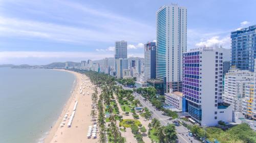 an aerial view of a beach and buildings at Novotel Nha Trang in Nha Trang