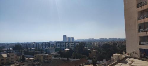 a view of a city with buildings in the distance at Baba Residence in Oran