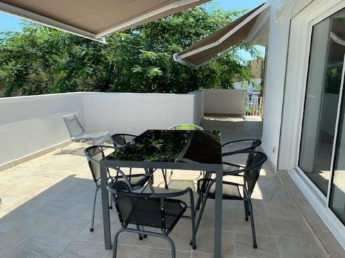 T2 climatisé + parking 500 m plage/centre ville