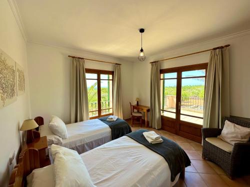 Postel nebo postele na pokoji v ubytování Es Serral