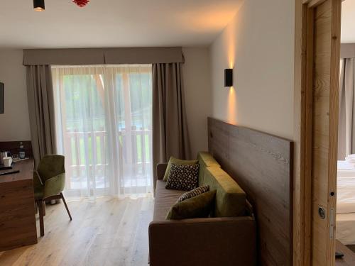 Un ou plusieurs lits dans un hébergement de l'établissement Hotel Miravalle