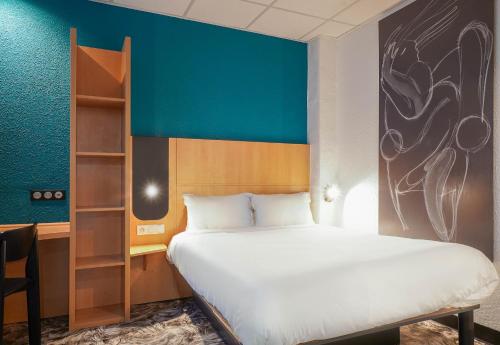 Katil atau katil-katil dalam bilik di B&B HOTEL Marseille Centre Vieux Port