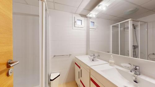 a white bathroom with a shower and a sink at Casa Espliego PJ-Murcia Holiday Rentals Property in Torre-Pacheco