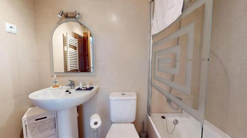 a bathroom with a sink and a toilet and a shower at Casa Esturion T-A Murcia Holiday Rentals Property in Roldán