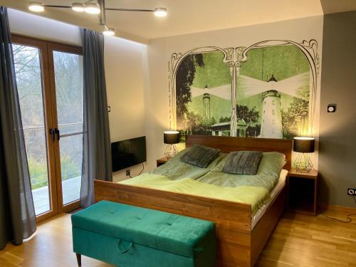 Ένα ή περισσότερα κρεβάτια σε δωμάτιο στο Apartament Morska Przygoda