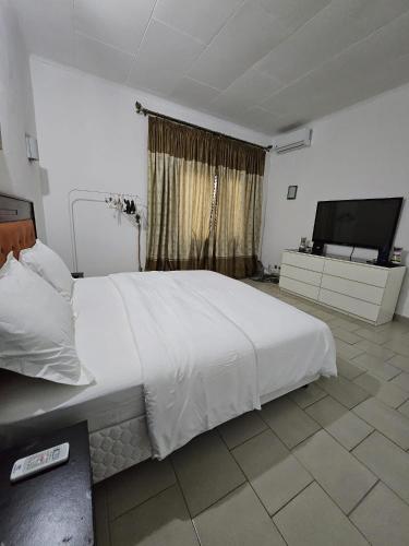 Postel nebo postele na pokoji v ubytování Octave's APT