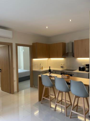 Η κουζίνα ή μικρή κουζίνα στο Oliva Verde Residences