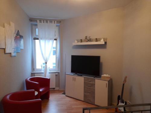 Μια τηλεόραση ή/και κέντρο ψυχαγωγίας στο Apartment Kaffeeduft