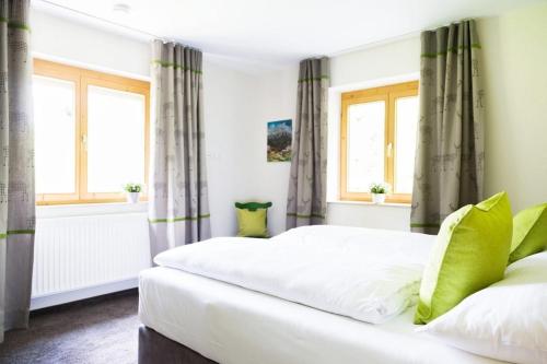 Ένα ή περισσότερα κρεβάτια σε δωμάτιο στο Wildgrün Maxi Lodge 7