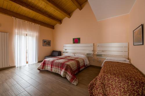 Voodi või voodid majutusasutuse B&B Rose Antiche toas