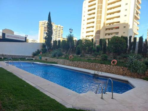Bazén v ubytování Nuevo apartamento junto al mar nebo v jeho okolí