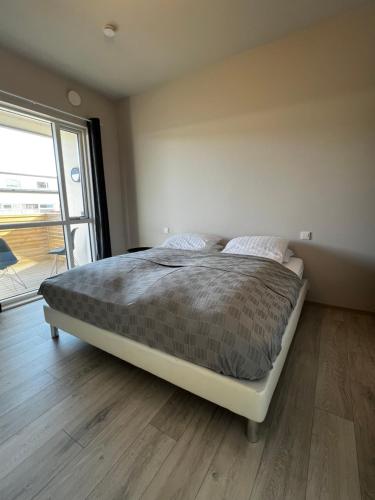 Postel nebo postele na pokoji v ubytování Stay Iceland apartments - G 1