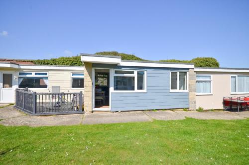 a house with a blue and white at 74 Sandown Bay Holiday Park, Isle of Wight in Sandown