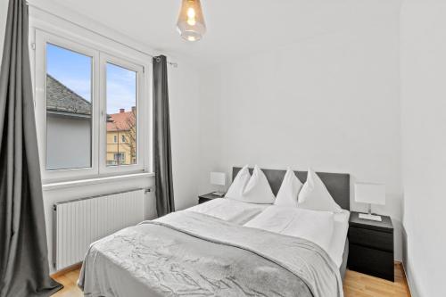 Postel nebo postele na pokoji v ubytování FarawayHomes Studio Fohnsdorf #1