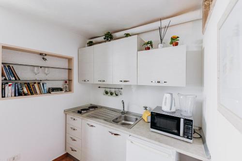 Kuchyň nebo kuchyňský kout v ubytování Case vacanze vista mare