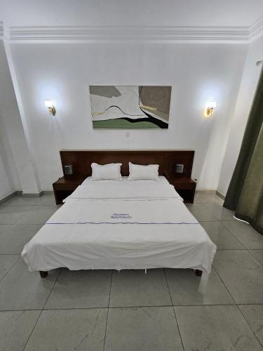 Postel nebo postele na pokoji v ubytování Octave's APT