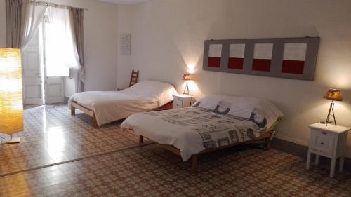 Postel nebo postele na pokoji v ubytování El refugi platja d'aro casa turistica