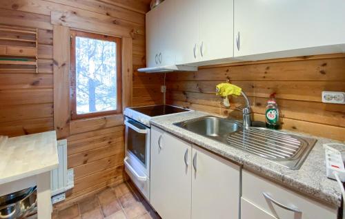 Una cocina o cocineta en Stuga 5