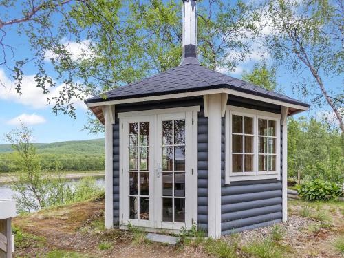 a gazebo with a cross on top of it at Holiday Home Mökki tenolla by Interhome in Utsjoki