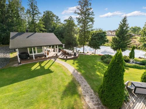 an overhead view of a backyard with a house at Holiday Home Villa jokiranta by Interhome in Eurajoki