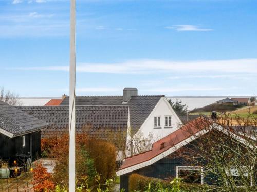 a view of a house with a roof at Holiday Home Elisabetha - 100m from the sea in Western Jutland by Interhome in Esbjerg