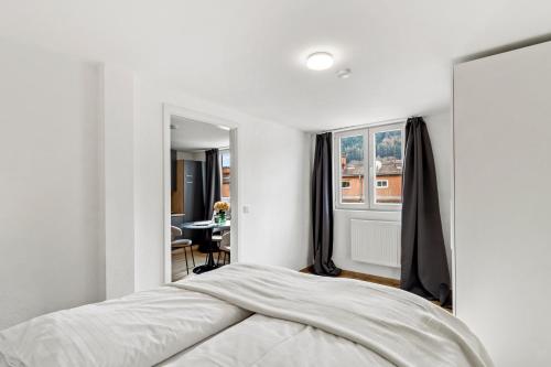 Giường trong phòng chung tại FarawayHomes Studio Leoben #P81