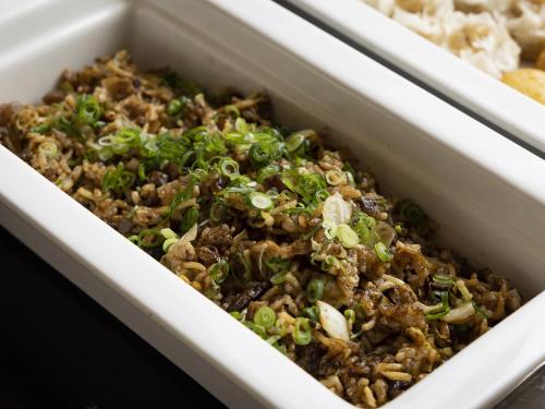 a white container filled with food in a table at Hotel Wing International Kobe - Shinnagata Ekimae in Kobe