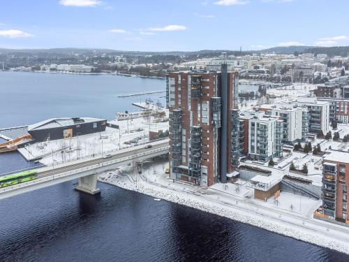 an aerial view of a city with a bridge at Holiday Home Horisontti penthouse by Interhome in Jyväskylä