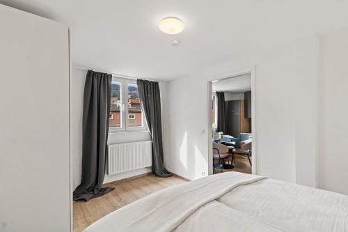 Ένα ή περισσότερα κρεβάτια σε δωμάτιο στο FarawayHomes Studio Leoben #P82