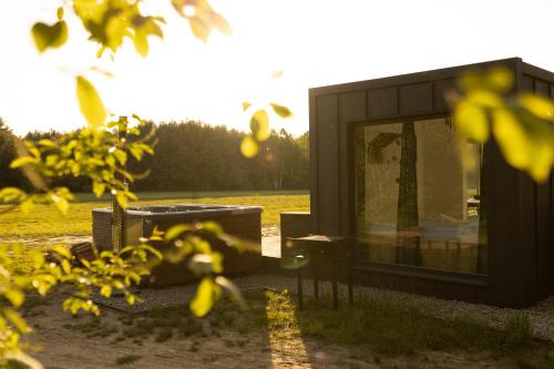 Zahrada ubytování Uroczy mały domek z jacuzzi