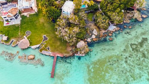 an aerial view of an island in the water at Azulea Bacalar Hotel & Spa - Lagoon Front in Bacalar