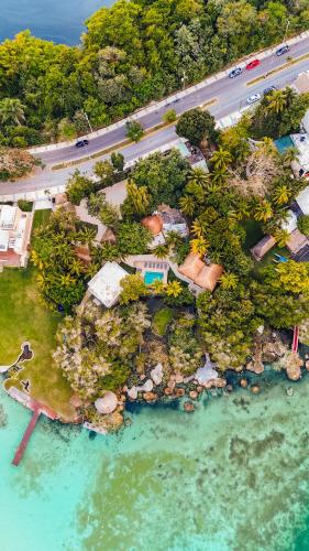 an aerial view of an island in the water at Azulea Bacalar Hotel & Spa - Lagoon Front in Bacalar