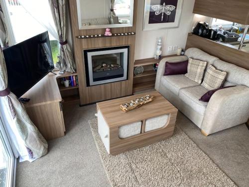 A seating area at Beautiful sea view 3 bedroomed Holiday Home Caravan