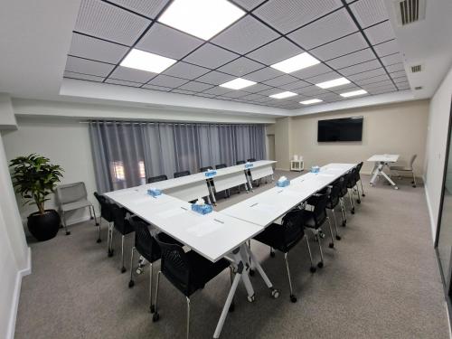 Espace de conférence ou salle de réunion dans l'établissement Melliber Appart Hotel