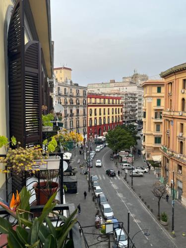 a view of a city street with cars and buildings at MiraMari in Naples