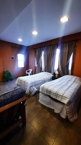 En eller flere senge i et værelse på Entre Montañas