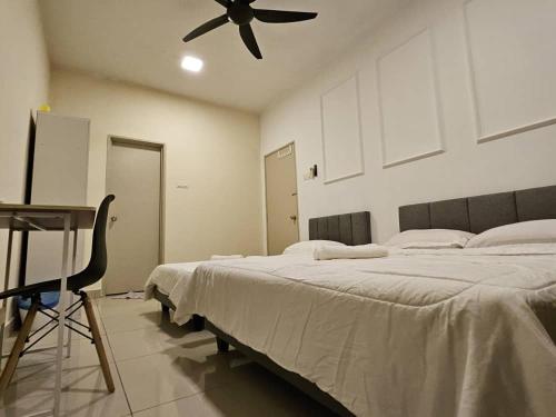 a bedroom with a bed and a ceiling fan at Charming Hideaway Room With Private Bathroom Near Bukit Jalil Stadium, Pavillion Bukit Jalil, APU in Kuala Lumpur