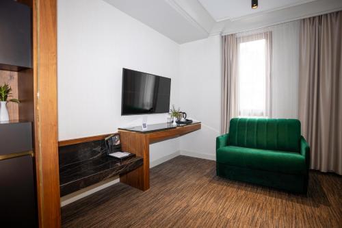 TV a/nebo společenská místnost v ubytování Select Hill Resort