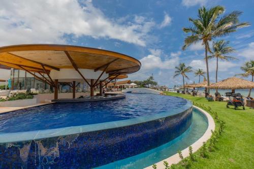 a pool at the resort at Villa Cala Marina + Jacuzzi in Colón