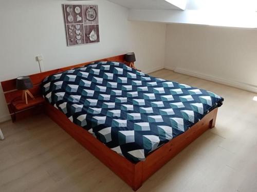 Кровать или кровати в номере Petite maison avec jardin