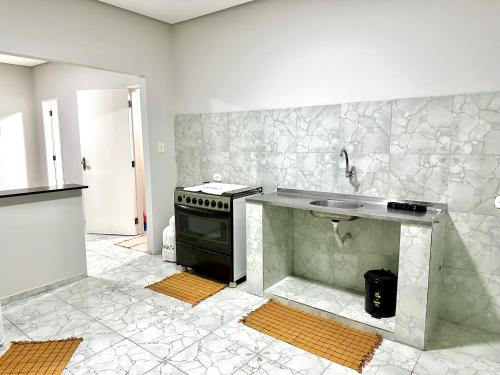Dapur atau dapur kecil di Apartamento em Pedro II