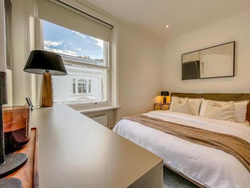 Be London - Belsize Park Residences tesisinde bir odada yatak veya yataklar