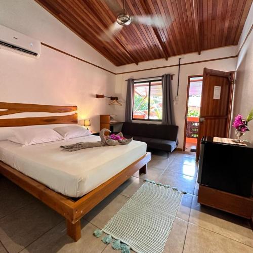 Кровать или кровати в номере Beach Front Bahia