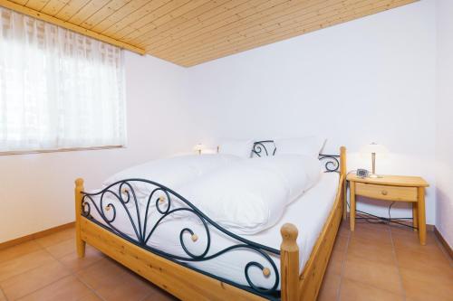 Postel nebo postele na pokoji v ubytování Apartment Brugg