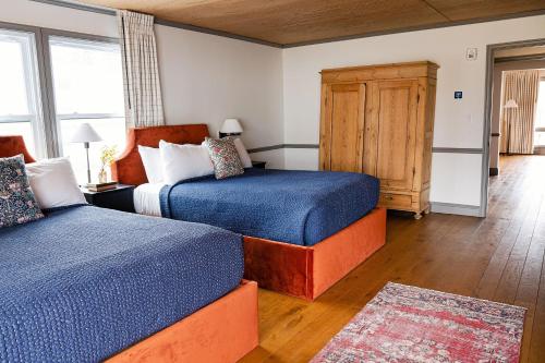 Ein Bett oder Betten in einem Zimmer der Unterkunft Wylder Windham