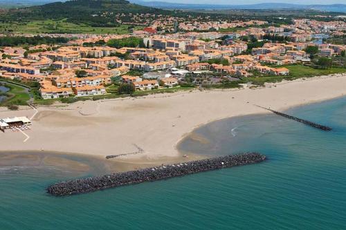 Archipel III, T2 mezzanine, parking, piscine, wifi
