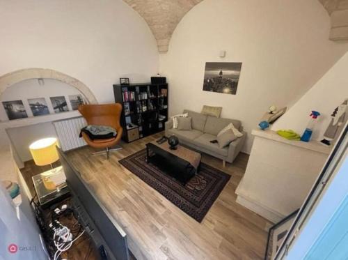 an overhead view of a living room with a couch at Maisonette 4-Room Roof Top in Centro Storico in Martina Franca