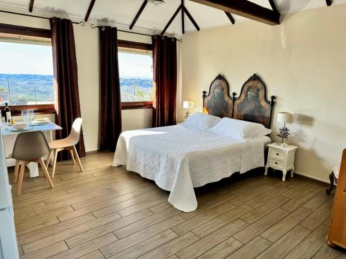 Ένα ή περισσότερα κρεβάτια σε δωμάτιο στο Villa Incanto Apartments