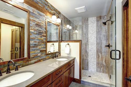 a bathroom with two sinks and a shower at Great Location Near Pool with Suncadia Pool Access in Cle Elum